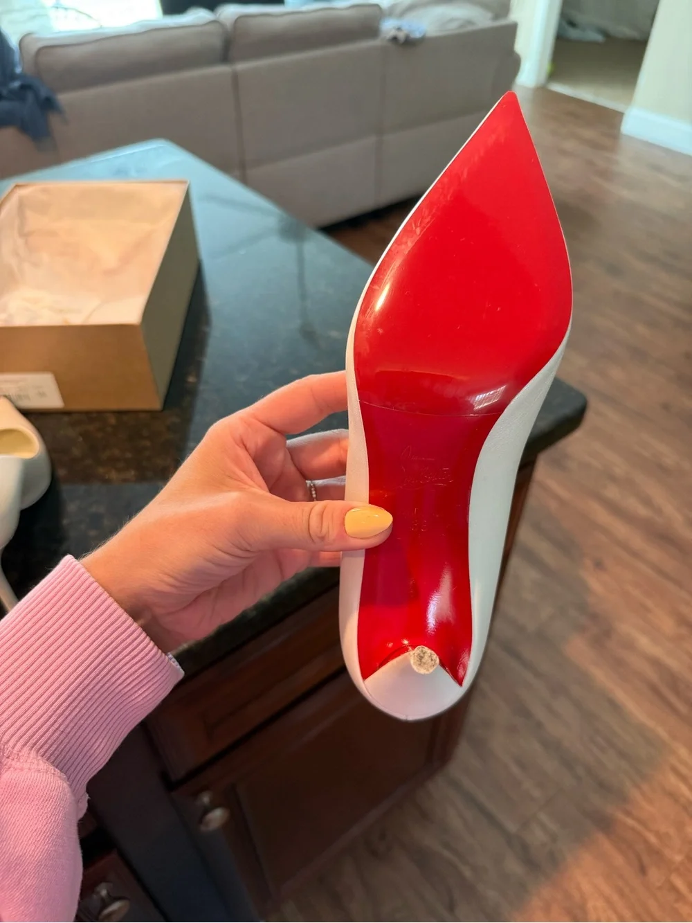 Christian Louboutin White Pointed-Toe Pump with Signature Red Sole